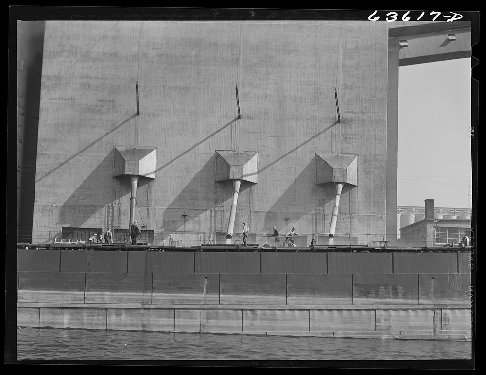 Grain boat loading at Occident elevator. Duluth, Minnesota. Sourced from the Library of Congress.