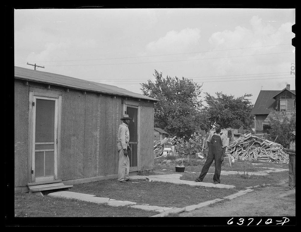  defense workers living in a Negro settlement near Detroit, Michigan. Sourced from the Library of Congress.