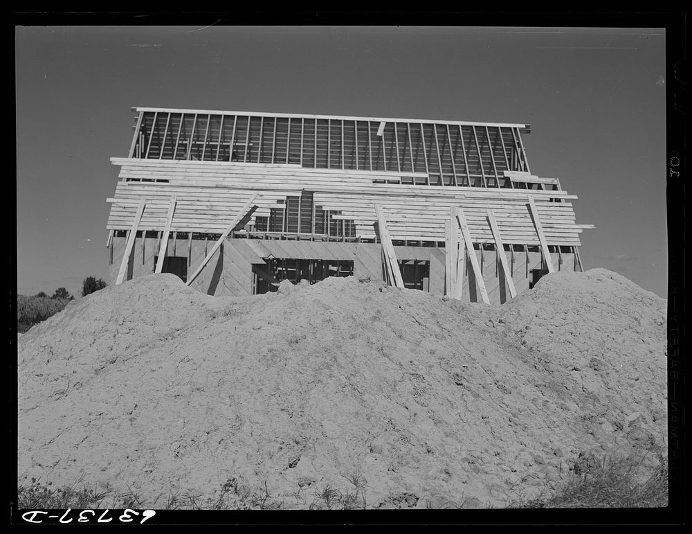 [Untitled photo, possibly related to: House in construction near Midland, Michigan]. Sourced from the Library of Congress.