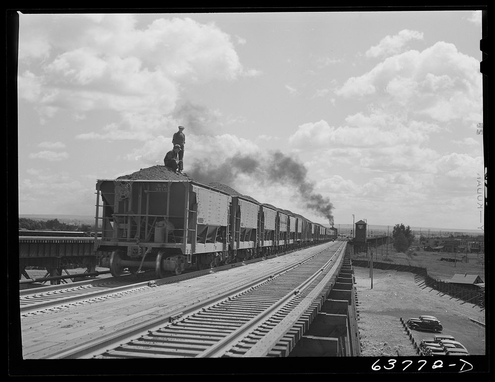 Cars of ore from the Minnesota iron range going onto loading docks at Allouez, Wisconsin. Sourced from the Library of…