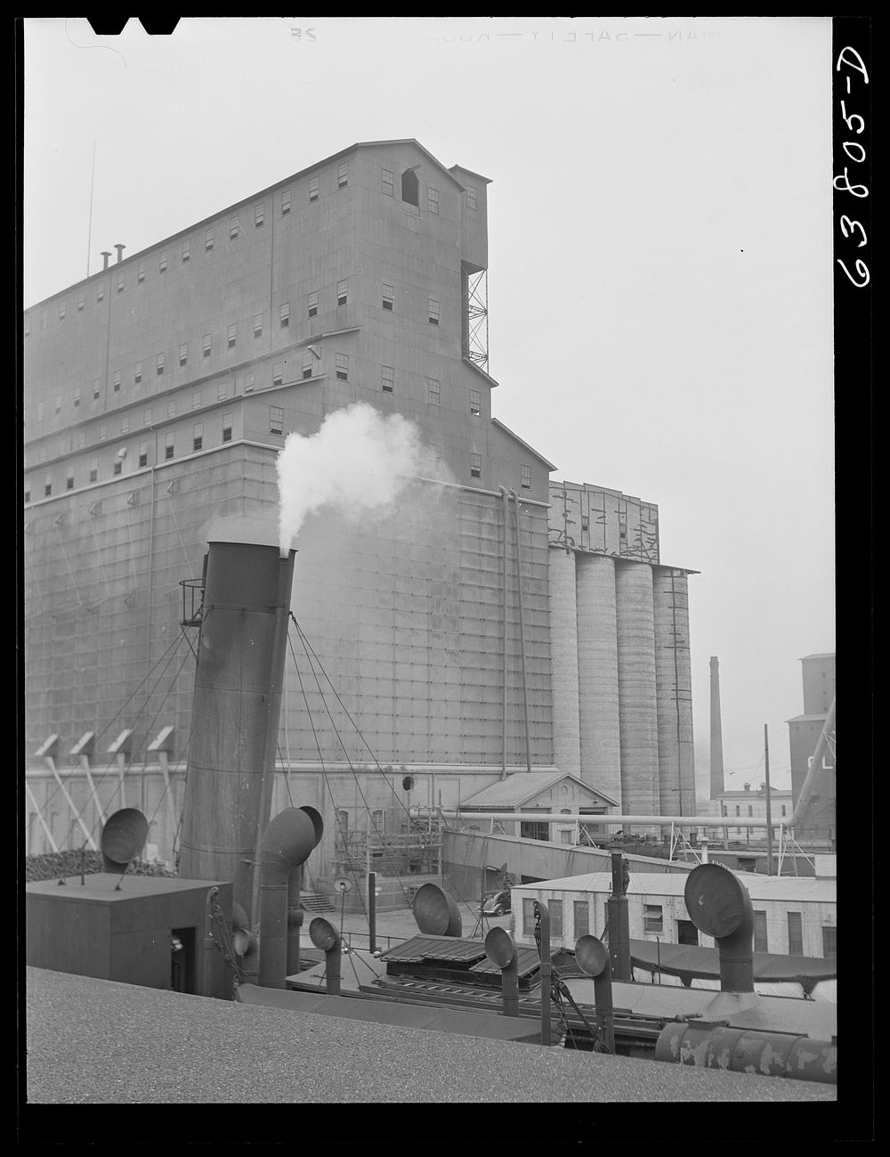 [Untitled photo, possibly related to: Great Northern grain elevator dock. Superior, Wisconsin]. Sourced from the Library of…
