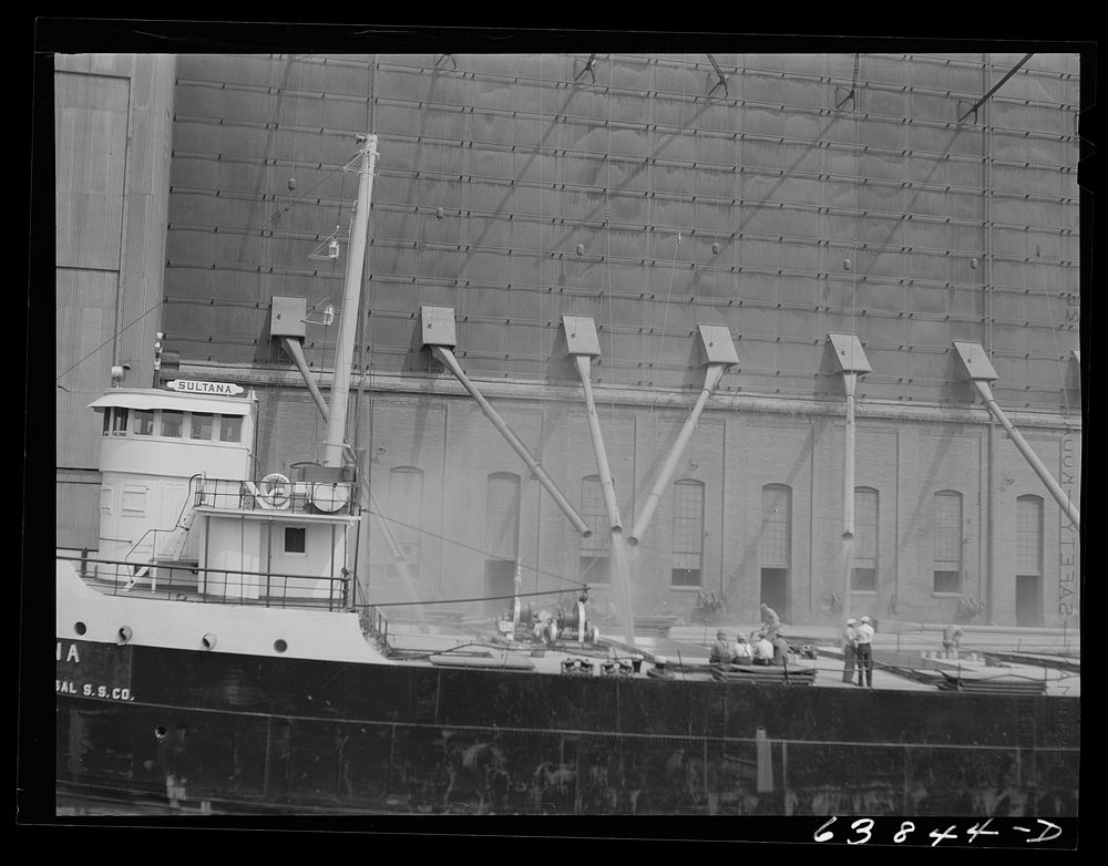 [Untitled photo, possibly related to: Loading grain boat at Great Northern elevator. Superior, Wisconsin]. Sourced from the…