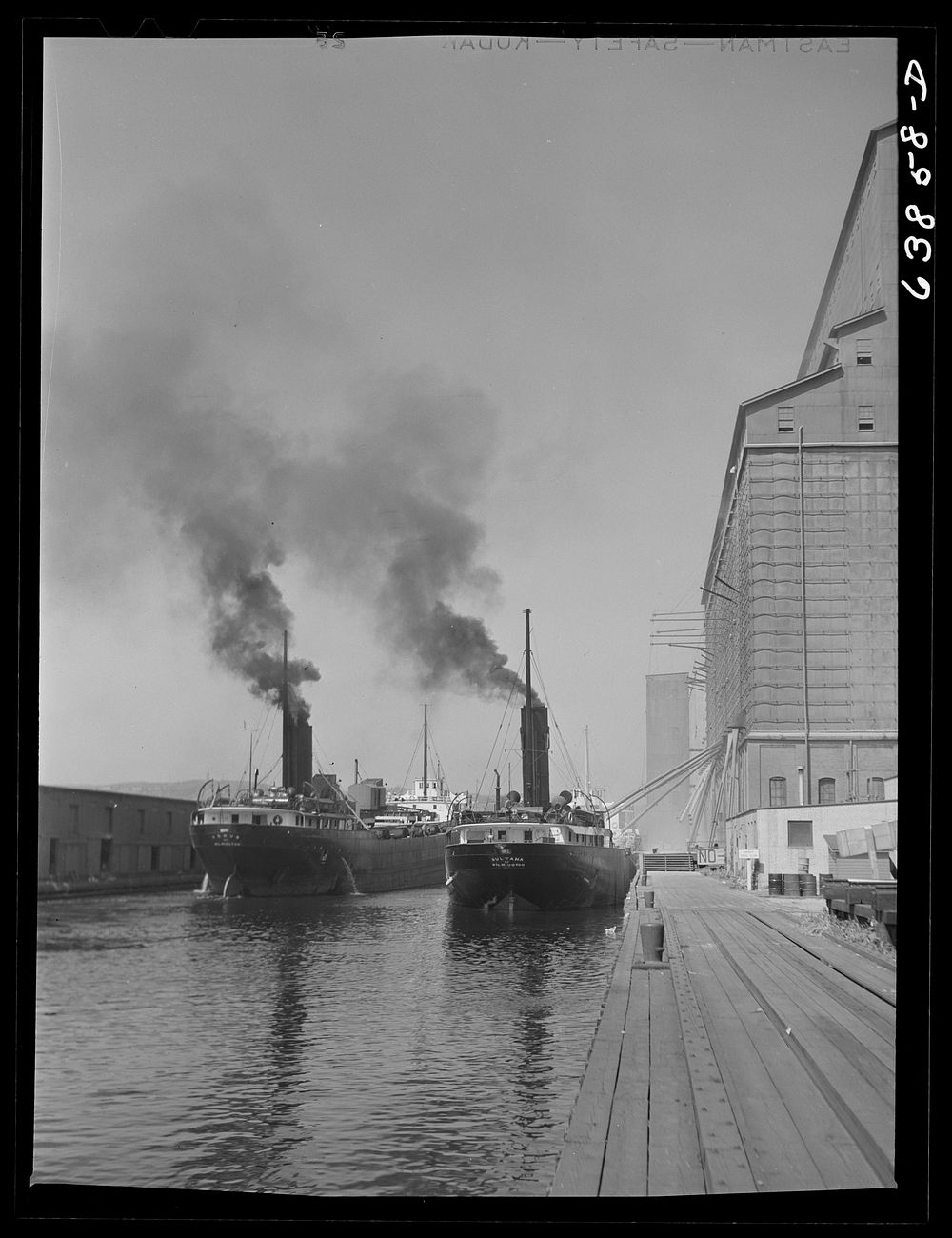 Great Lakes boat at Great Northern elevator. Superior, Wisconsin. Sourced from the Library of Congress.