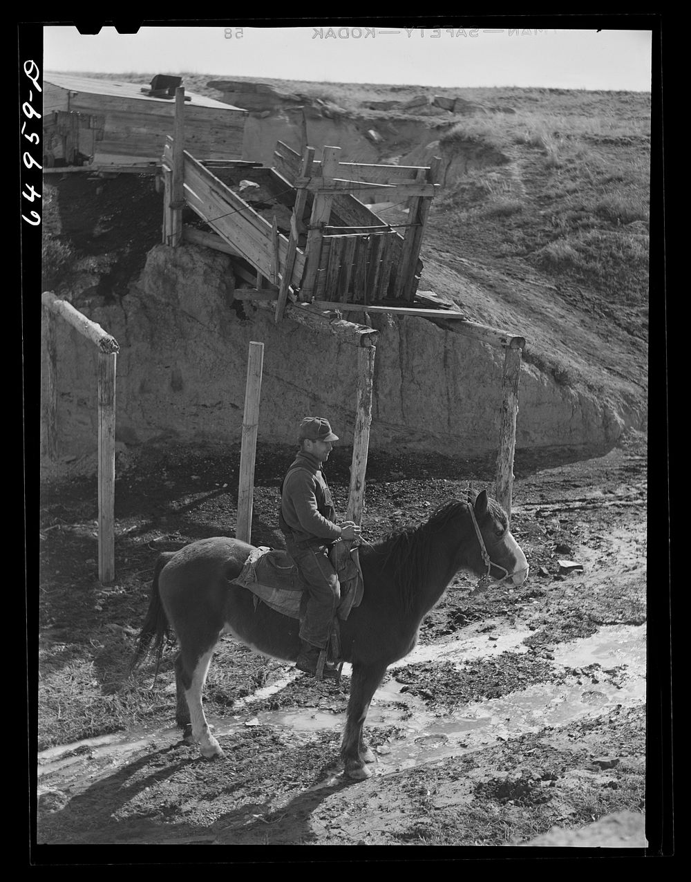 McCone County, Montana. Coal miner who lives in a sheep wagon, and operates this mine on the edge of the badlands for the…