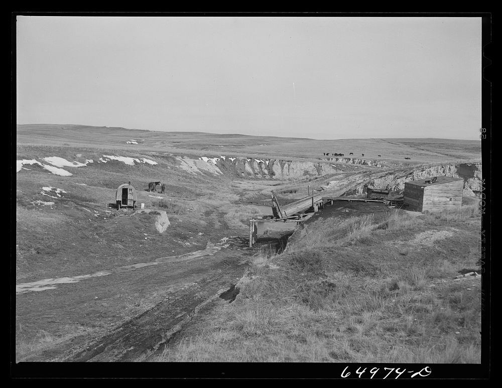 McCone County, Montana. Coal mine on the edge of the badlands. The operator lives in sheep wagon. Sourced from the Library…