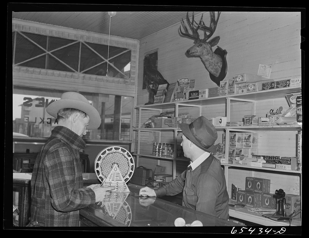 [Untitled photo, possibly related to: Wisdom, Montana. Fetty's Bar on Saturday afternoon]. Sourced from the Library of…