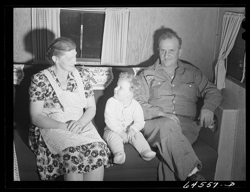 Burlington, Iowa. Acres unit of FSA (Farm Security Administration) camp. DeHolt family in their trailer for workers at…