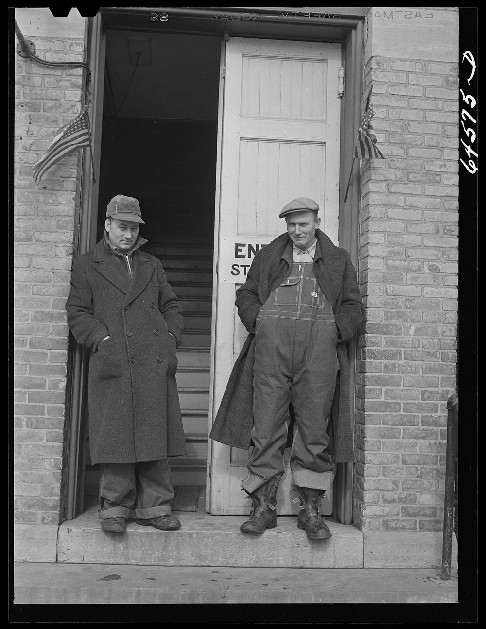 Glencoe, Minnesota. Farmers who have registered under Selective Service act in the firehouse at Glencoe, Minnesota. Sourced…