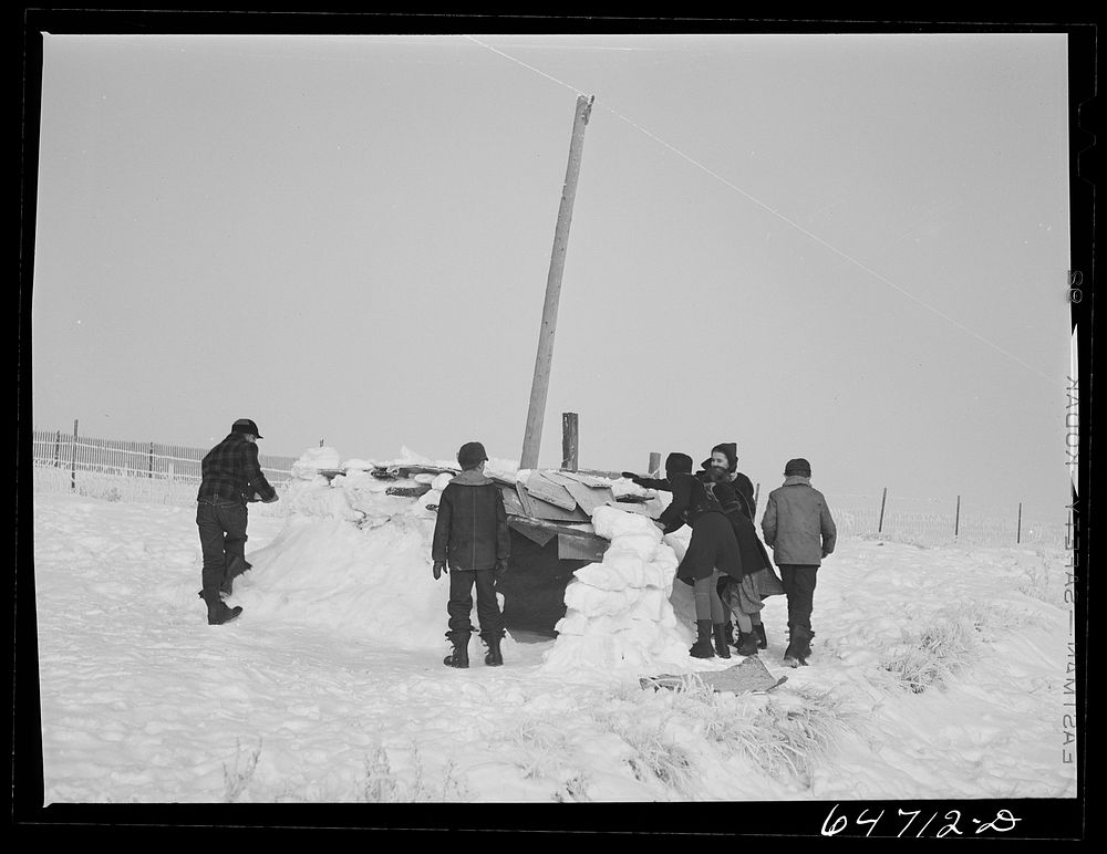 Morton County, North Dakota. Building snow fort at noon recess at a rural school. Sourced from the Library of Congress.