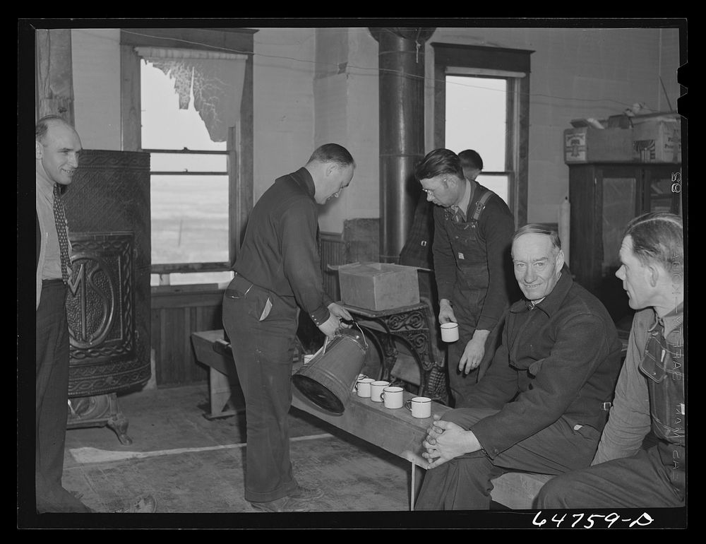 [Untitled photo, possibly related to: Adams County, North Dakota. Farmers brought their own lunch to an all-day Food for…