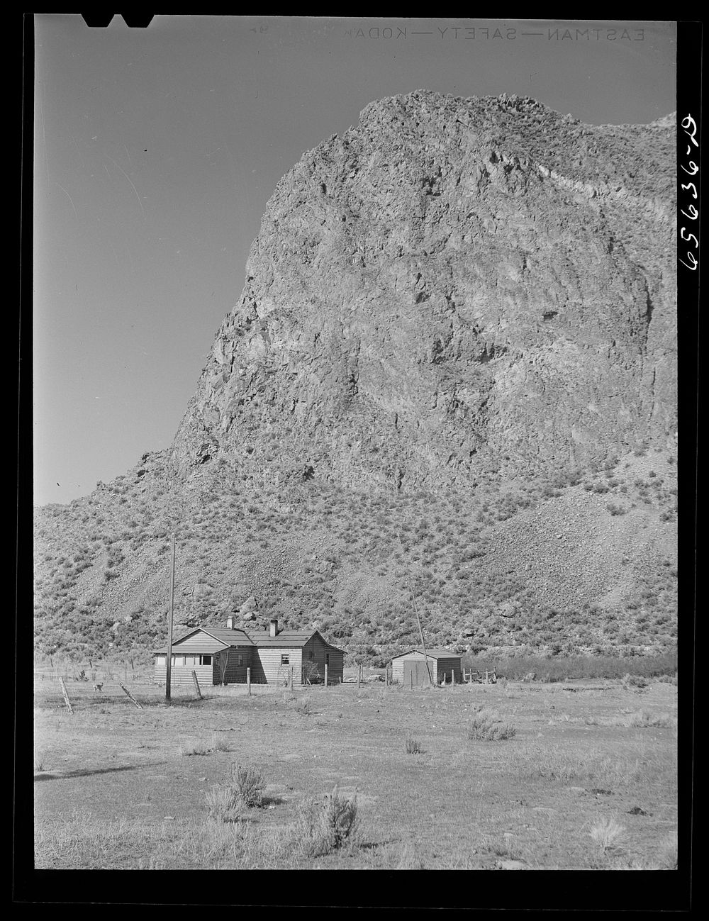 Beaverhead County, Montana. Cabin at the foot of a mountain. Sourced from the Library of Congress.