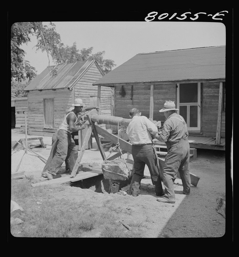 Windlass lifts cement wall from well. John Hardesty well project, Charles County, Maryland. Sourced from the Library of…