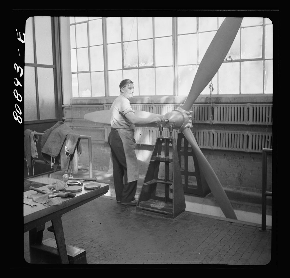 [Untitled photo, possibly related to: Balancing propeller. Hamilton propeller plant, East Hartford, Connecticut]. Sourced…
