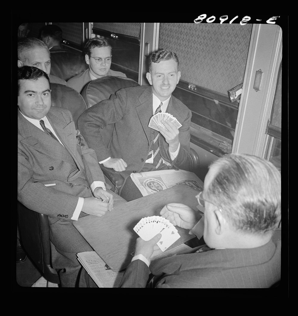 [Untitled photo, possibly related to: Commuters playing bridge on train to New York City]. Sourced from the Library of…