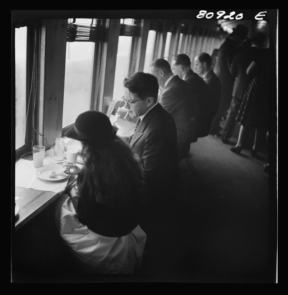 Commuters on train to New York City. Sourced from the Library of Congress.