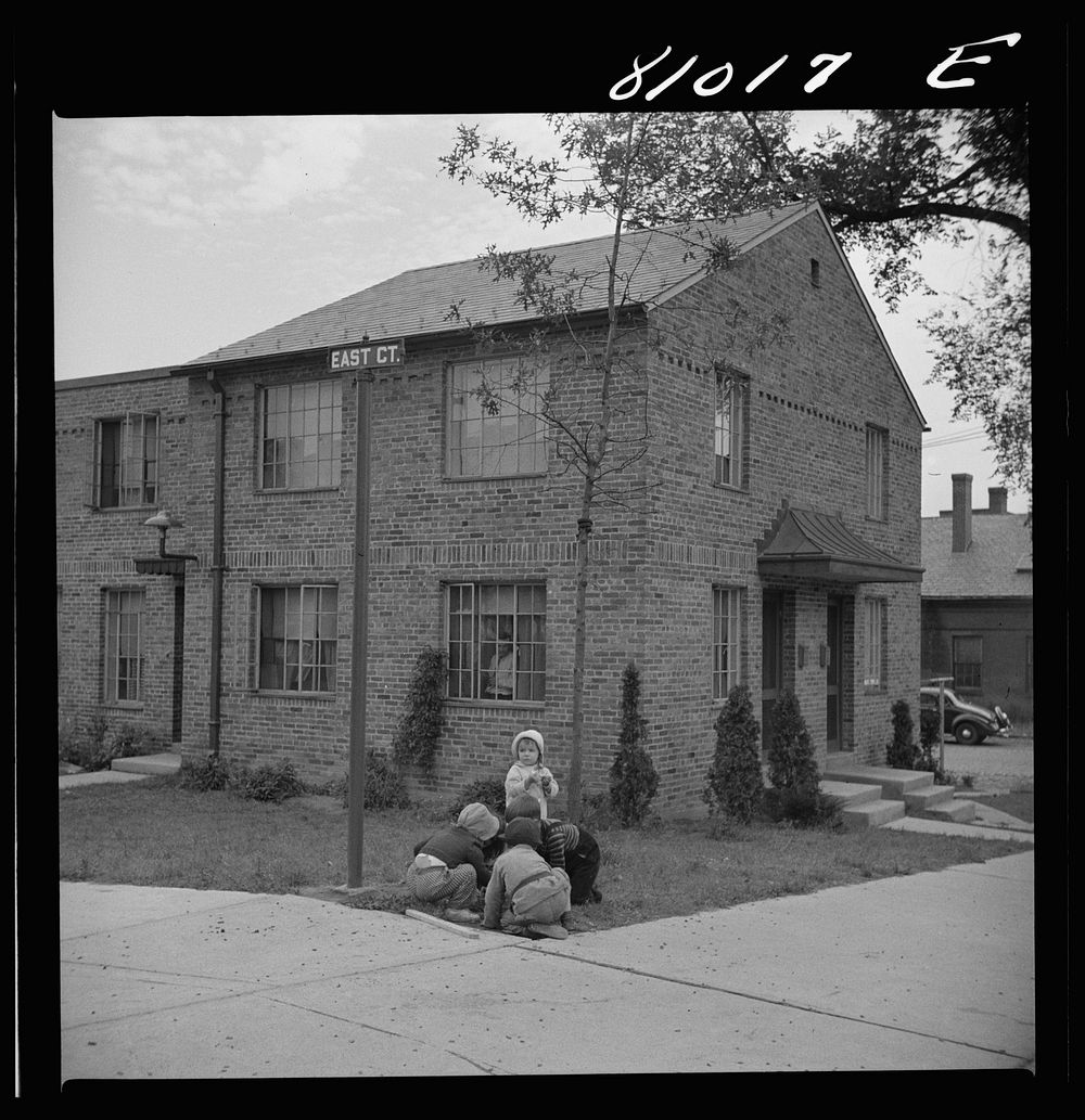 [Untitled photo, possibly related to: Children play in safety in the FHA (Federal Housing Administration) low income housing…