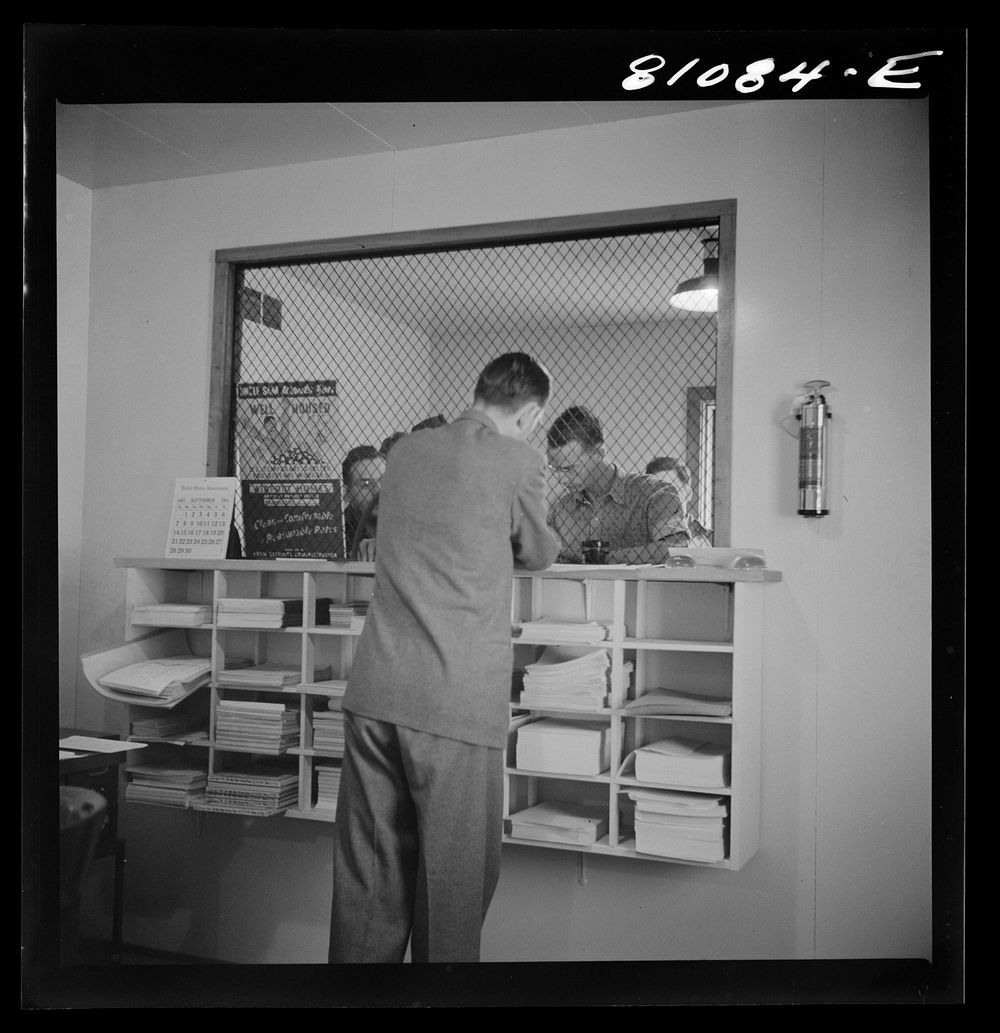 Defense worker waiting to sign up for houses in the FSA (Farm Security Administration) defense housing project. Hartford…