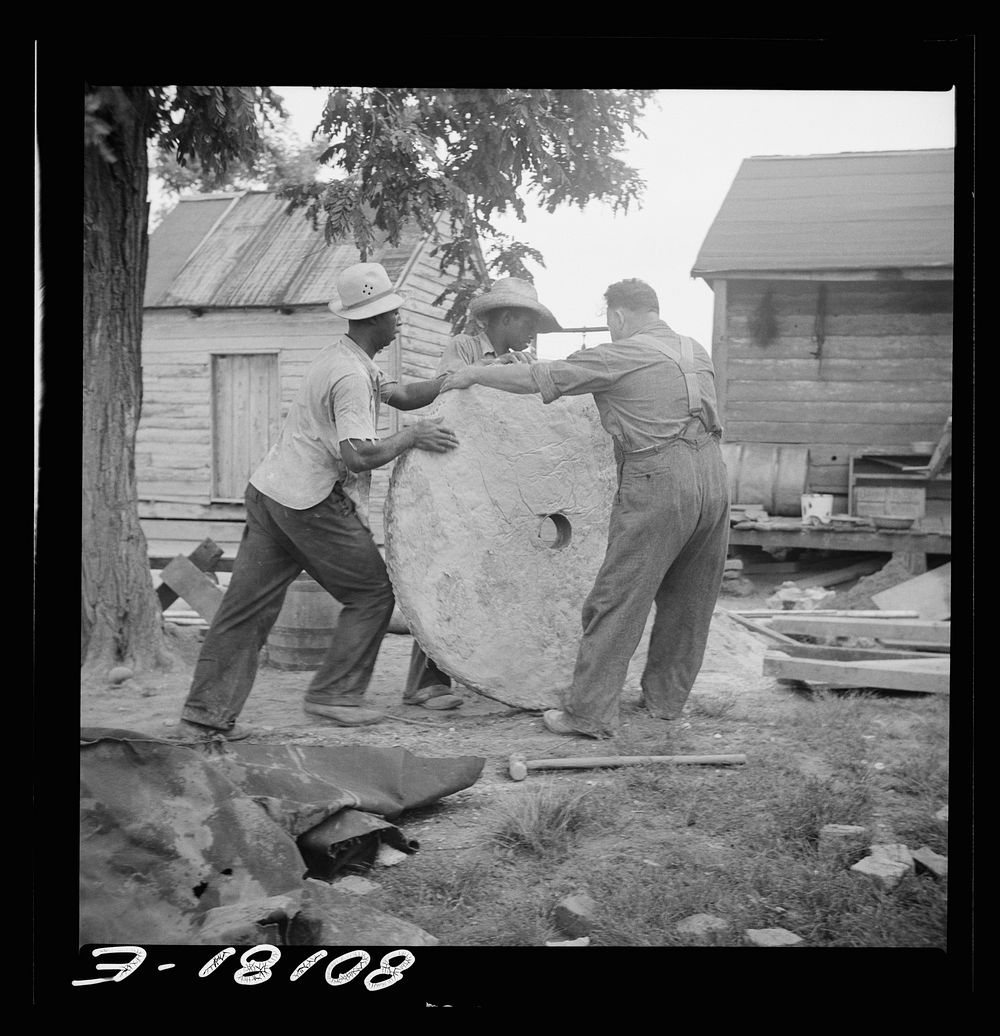 The stone cap is rolled to the well. John Hardesty well project, Charles County, Maryland. Sourced from the Library of…