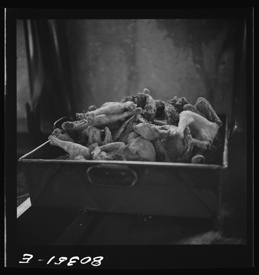 [Untitled photo, possibly related to: A hot tray of crisp chicken. Craig Field, Southeastern Air Training Center, Selma…