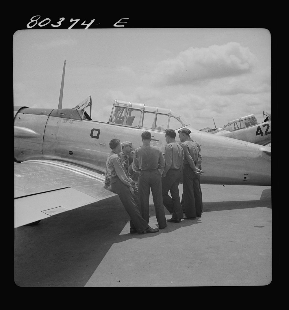 Craig Field flying cadets talking things over. Craig Field, Southeastern Air Training Center, Selma, Alabama. Sourced from…