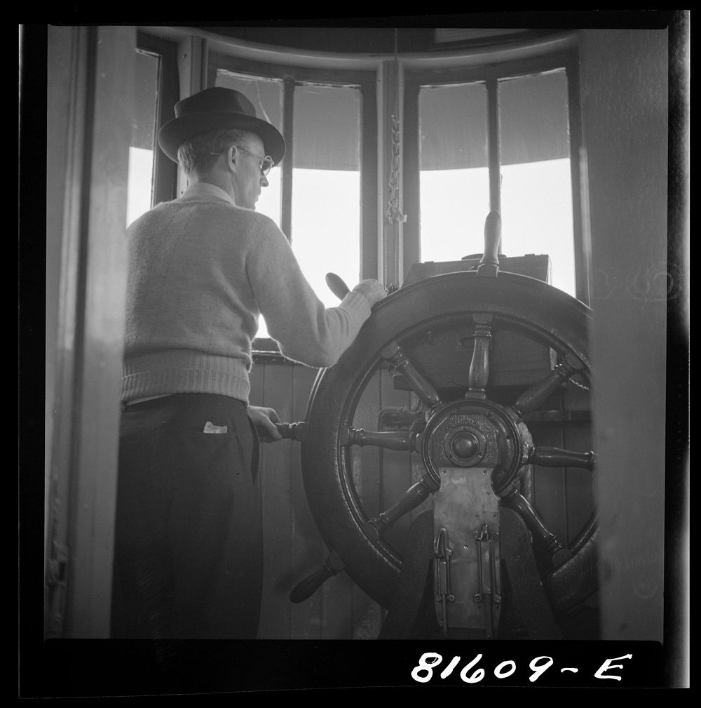 [Untitled photo, possibly related to: Pilot on Hudson River ferry between Hudson and Athens, New York]. Sourced from the…