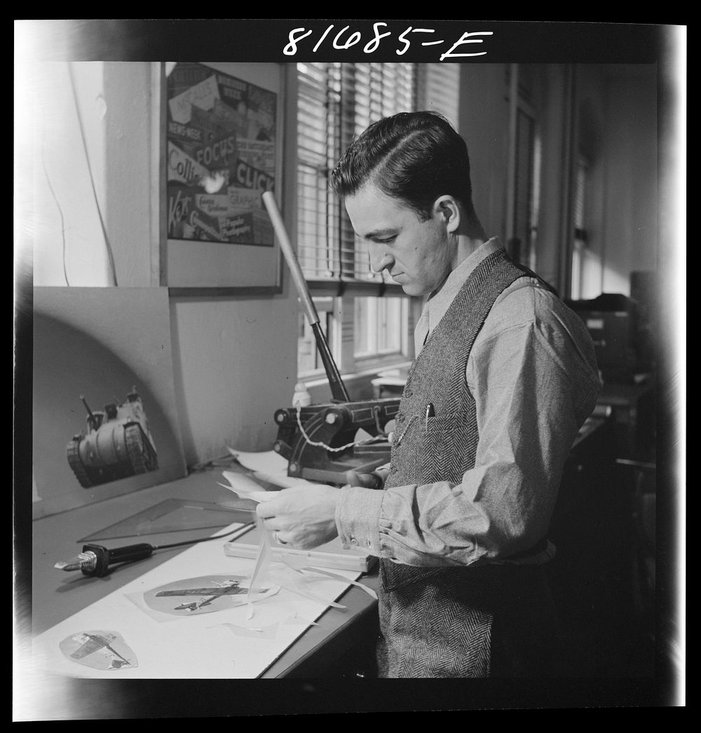 [Untitled photo, possibly related to: Washington, D.C. Preparing the defense bonds sales photomural, to be installed in the…