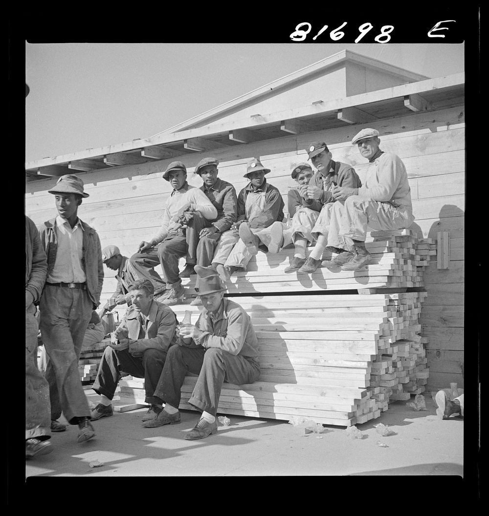 [Untitled photo, possibly related to: Workmen at lunch hour on emergency office space construction job. Washington, D.C.].…