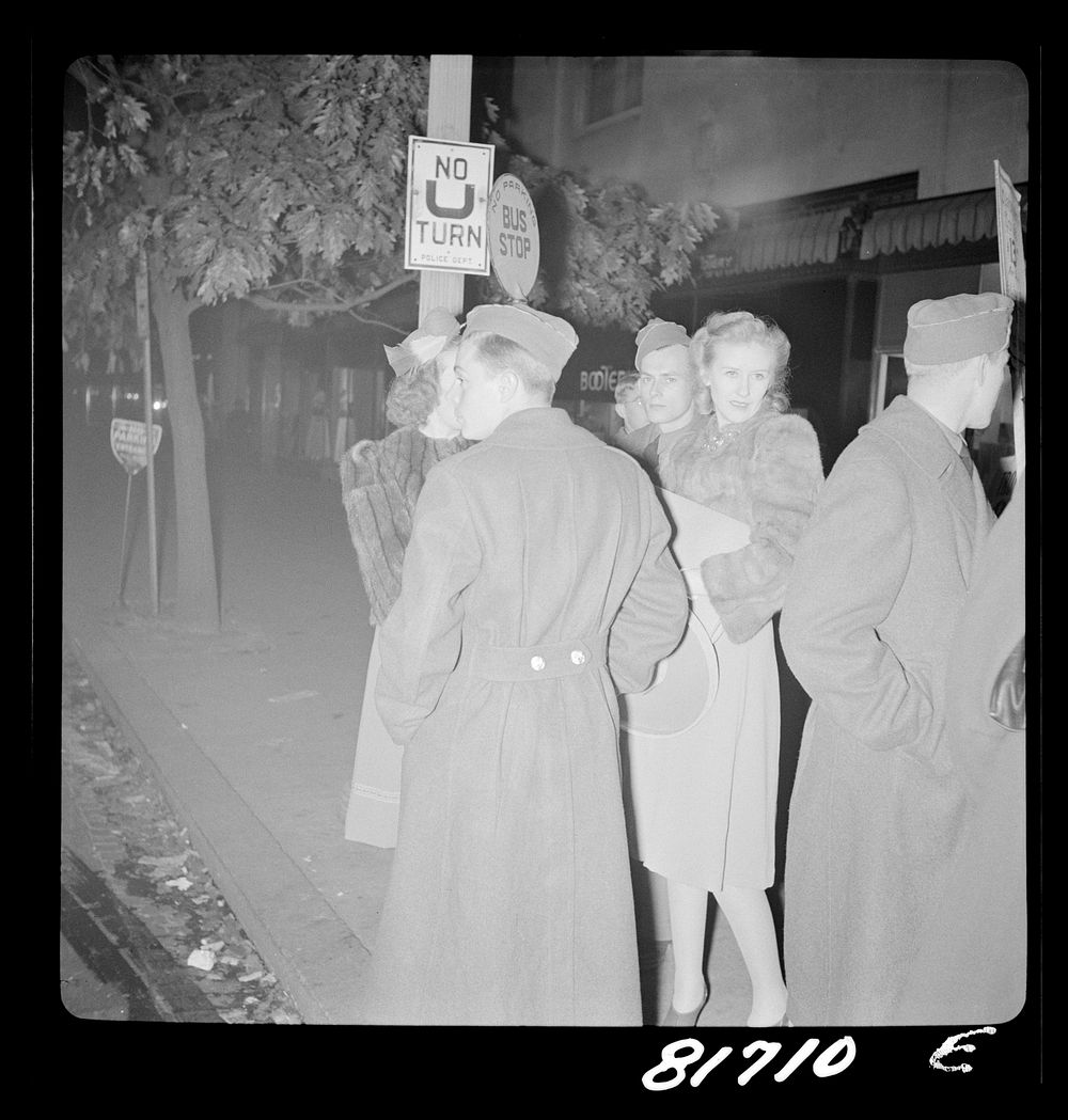 Servicemen waiting for bus at 11:00 p.m. Washington, D.C.. Sourced from the Library of Congress.