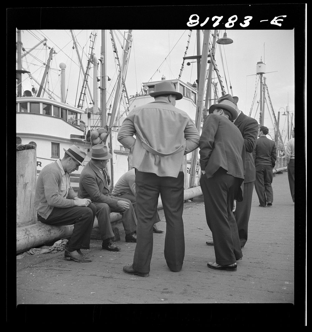 Italian fishermen gathered on "Fisherman's Wharf." San Francisco, California. Sourced from the Library of Congress.