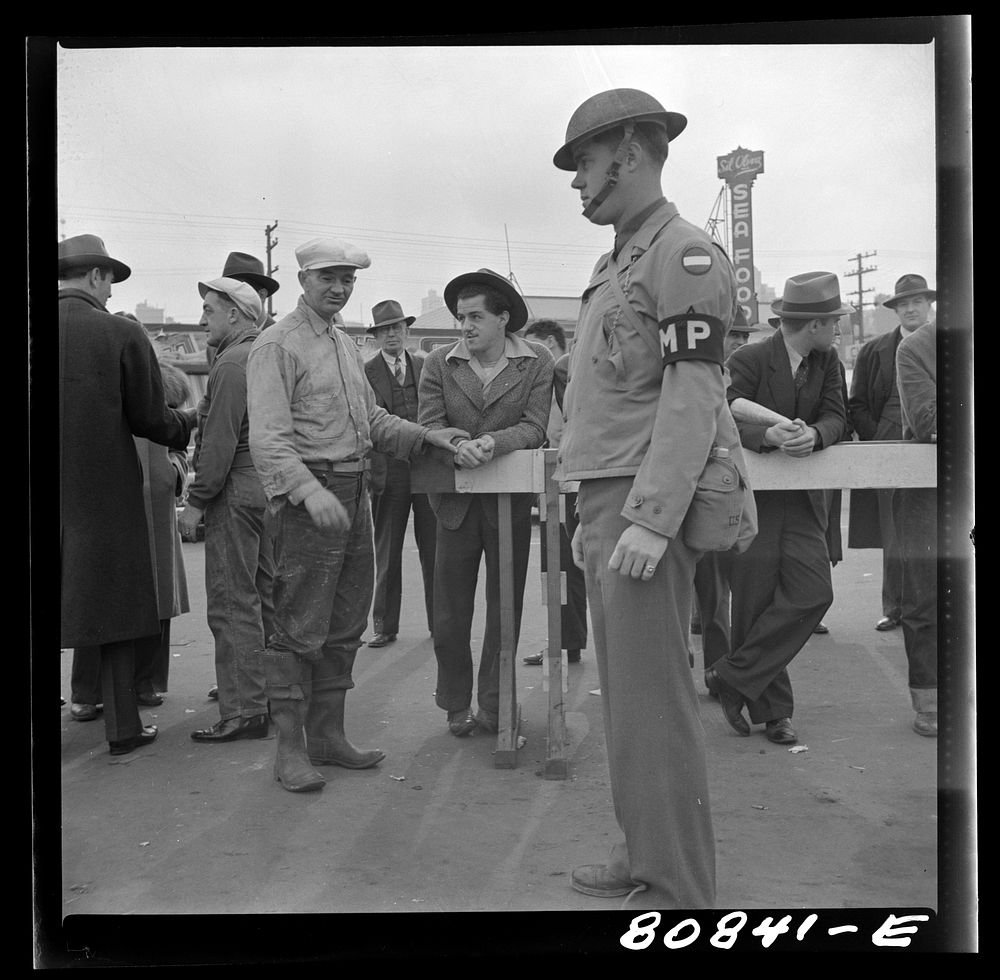 Sentry on guard at the Army transport dock. San Francisco, California. Sourced from the Library of Congress.