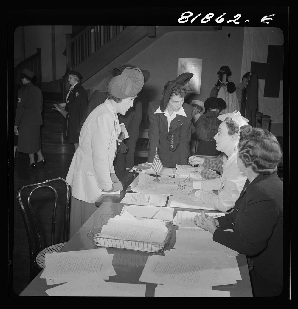 Signing up for Red Cross duties. Red Cross headquarters, San Francisco, California. Sourced from the Library of Congress.