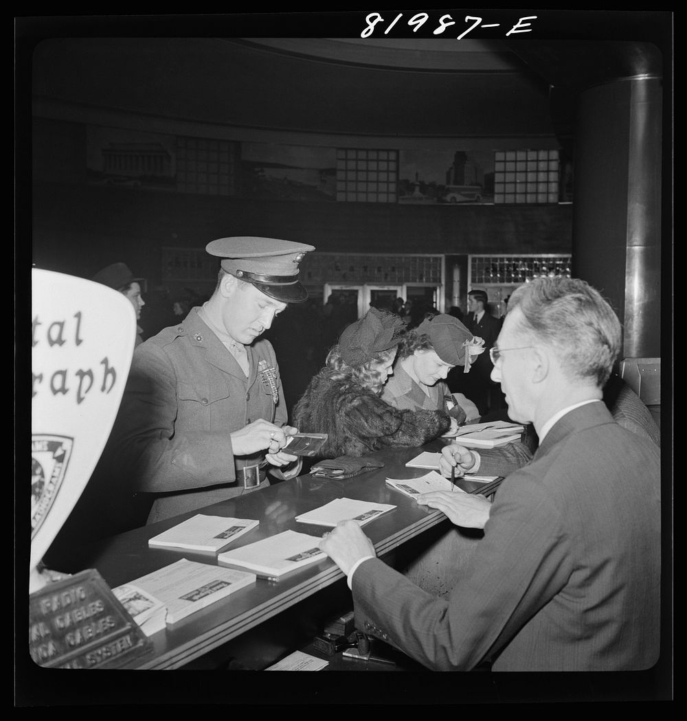 Marine just home from Cuba. Greyhound bus depot, Washington, D.C.. Sourced from the Library of Congress.
