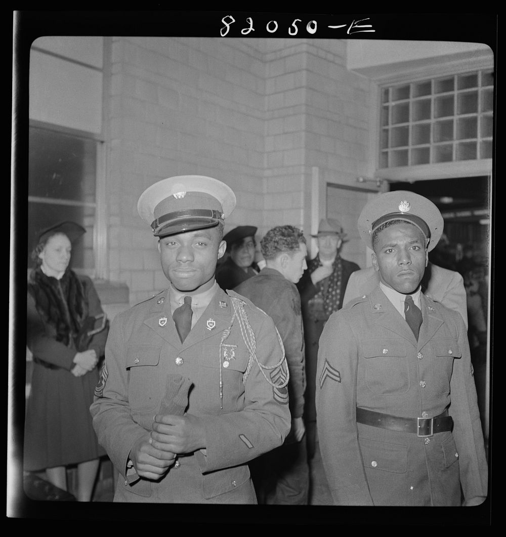 Washington, D.C. Christmas rush in the Greyhound bus terminal.  soldiers waiting for a bus. Sourced from the Library of…