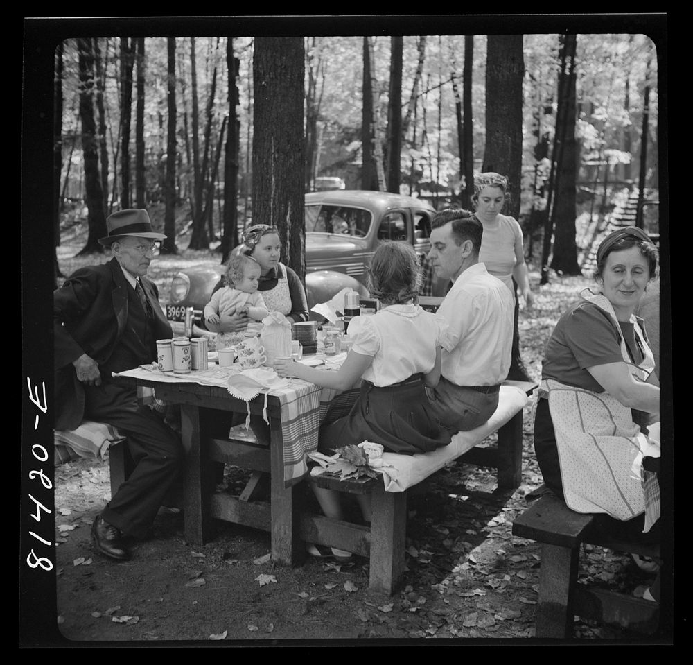 Picnic party from the mill towns enjoys the autumn foliage along the Mohawk Trail in Massachusetts. State-owned park.…
