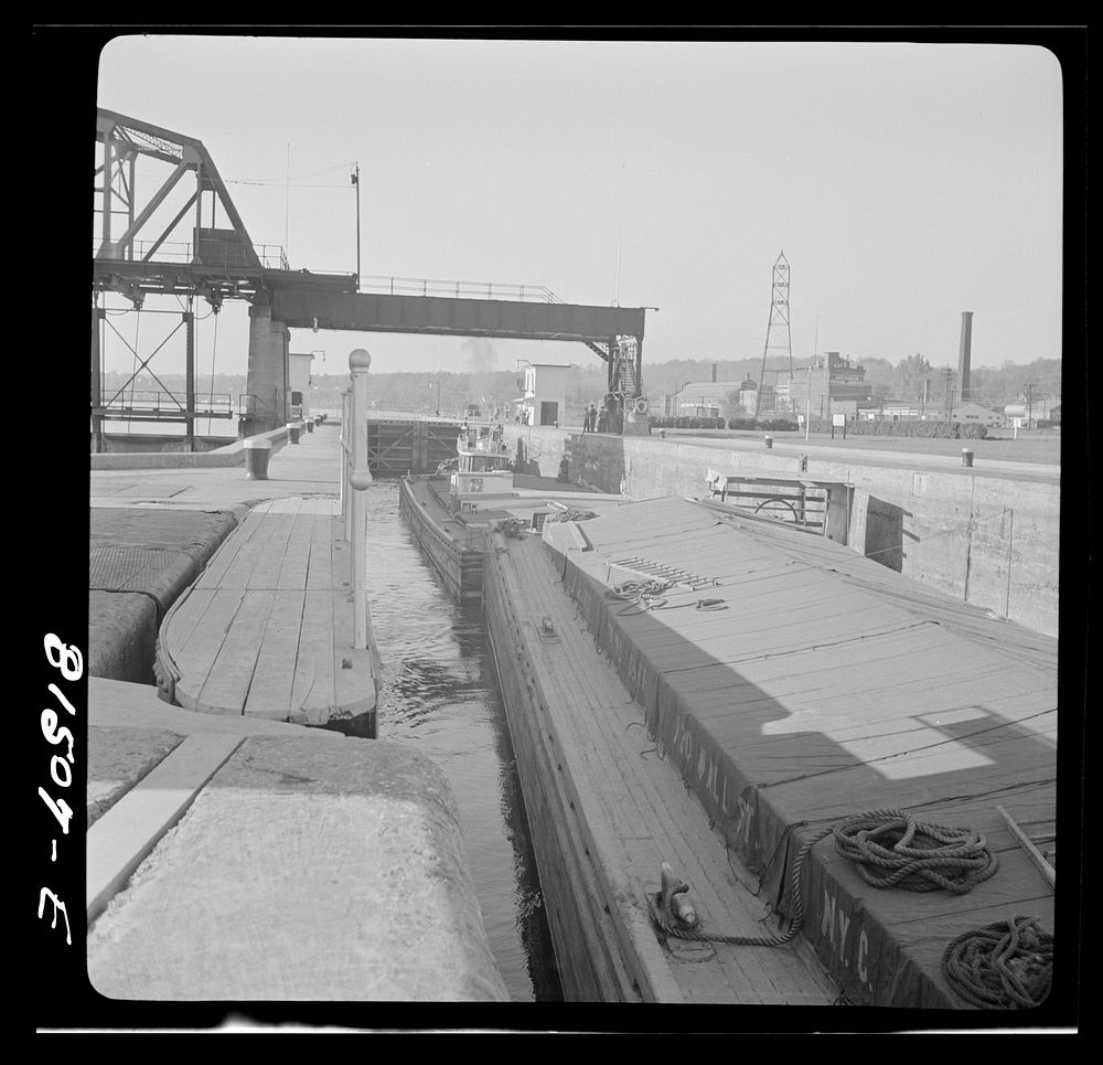 [Untitled photo, possibly related to: Tug pulling barges through Lock Eleven. Erie Canal, New York]. Sourced from the…