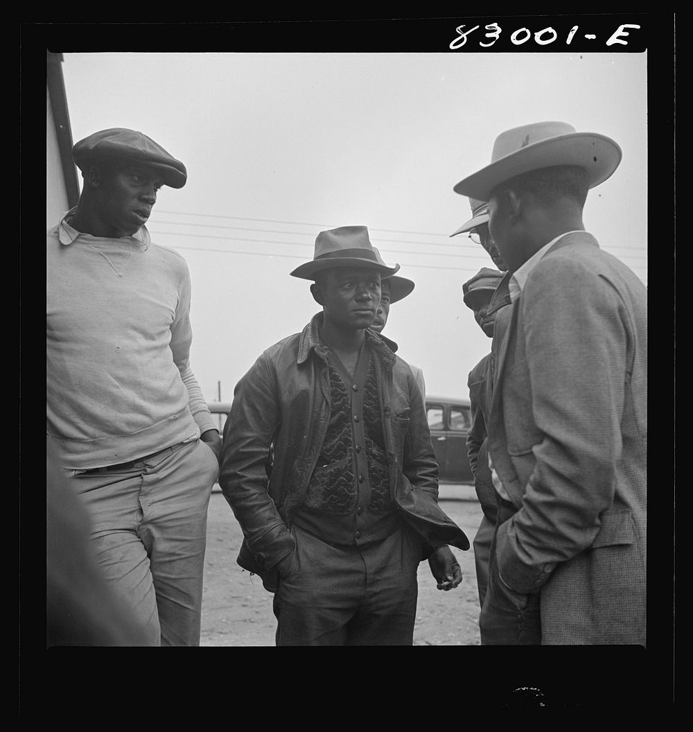 Bridgeton, New Jersey. FSA (Farm Security Administration) agricultural workers' camp. Talking things over. Sourced from the…