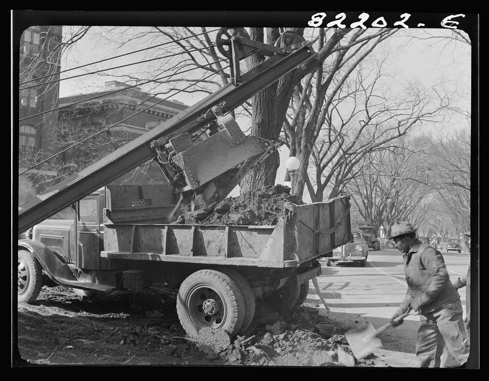 Washington, D.C. Clearing earth and old paving for extension of Independence Avenue at Fourteenth. Sourced from the Library…