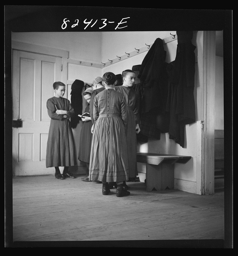 Hinkletown, Pennsylvania (vicinity). Mennonite girls waiting for "Deutsch school" to begin in Mennonite church. Sourced from…
