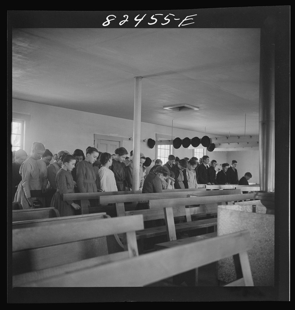 Hinkletown, Pennsylvania. Mennonite children in prayer in a Mennonite church. Sourced from the Library of Congress.
