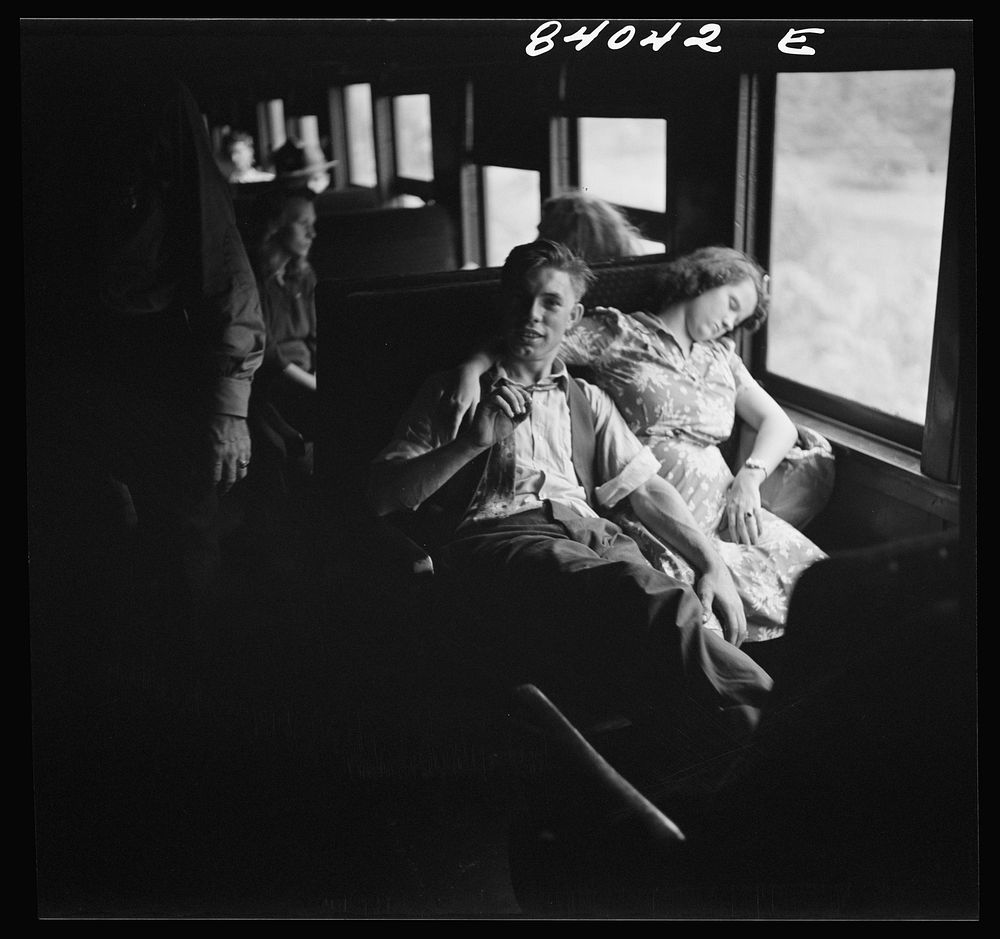 [Untitled photo, possibly related to: Boy and girl from Richwood, West Virginia en route to upper New York state to work in…
