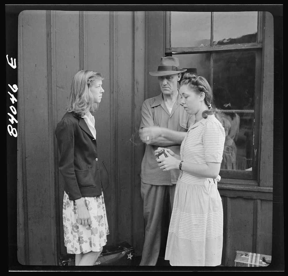 Richwood, West Virginia. Girls waiting to leave for upper New York state to help with the harvest. Sourced from the Library…