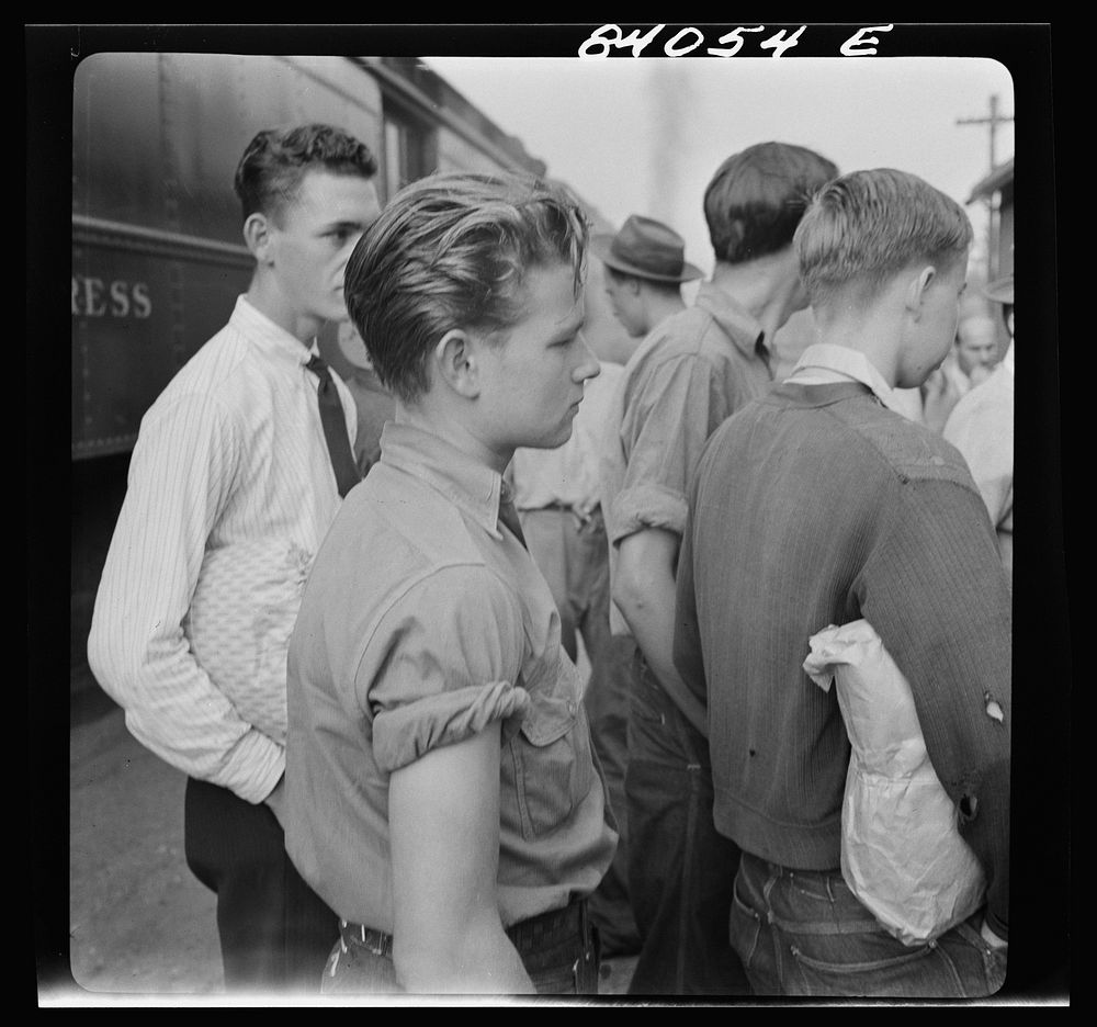 [Untitled photo, possibly related to: Richwood, West Virginia. Station scene at departure of men to help in the harvest in…
