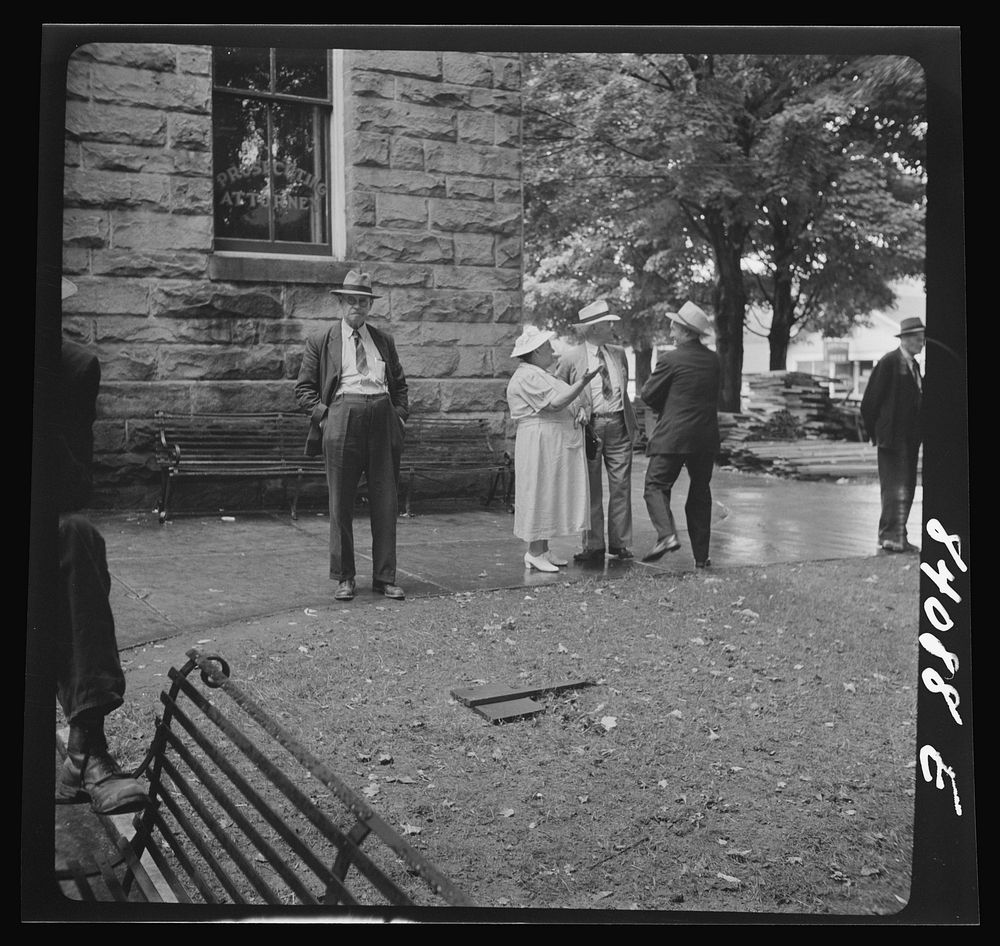 Summersville, West Virginia. Gossiping in the courthouse square. Sourced from the Library of Congress.