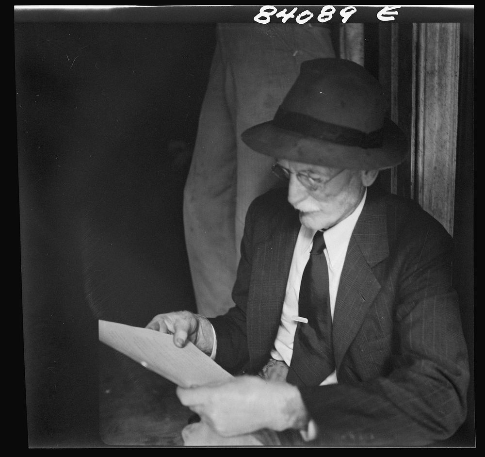 [Untitled photo, possibly related to: Summersville, West Virginia. Oldsters examining the FSA (Farm Security Administration)…