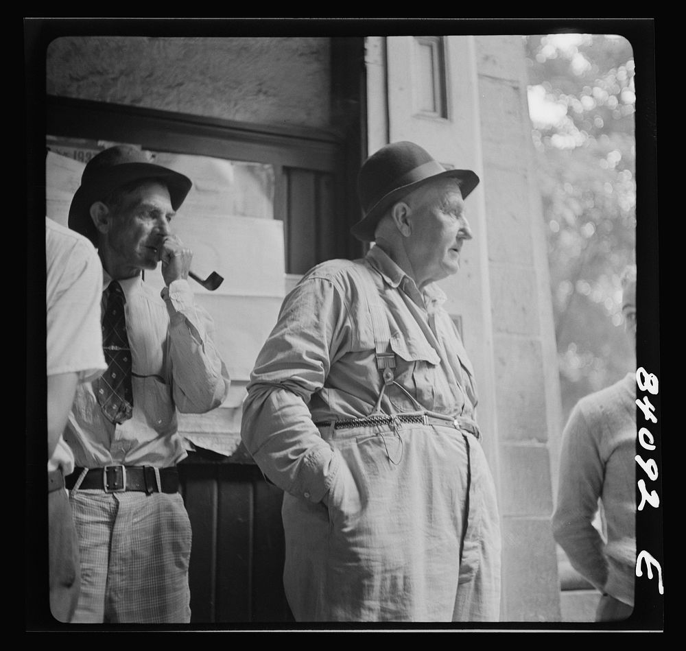 [Untitled photo, possibly related to: Summersville, West Virginia. Cynical citizens watching FSA (Farm Security…