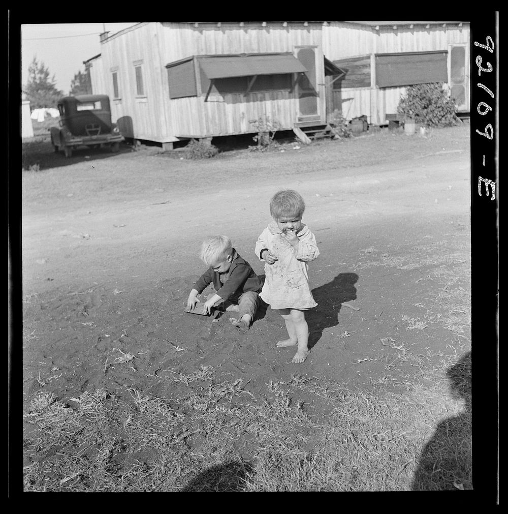 [Untitled photo, possibly related to: Migrant laborers children living in overcrowded camps with very bad sanitary…