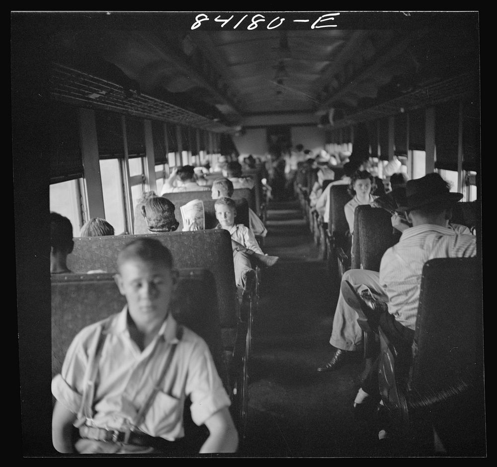 [Untitled photo, possibly related to: Special train carrying agricultural workers to upper New York state to work in the…
