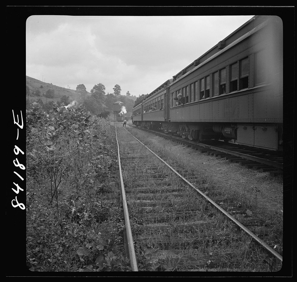 [Untitled photo, possibly related to: Picking up the Clay section of the special train carrying agricultural workers to…