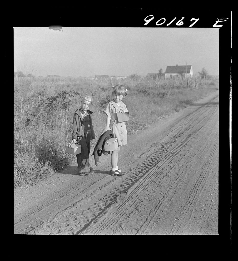 Children of Two Rivers, FSA (Farm Security Administration) project, going to school. Waterloo, Nebraska. Sourced from the…