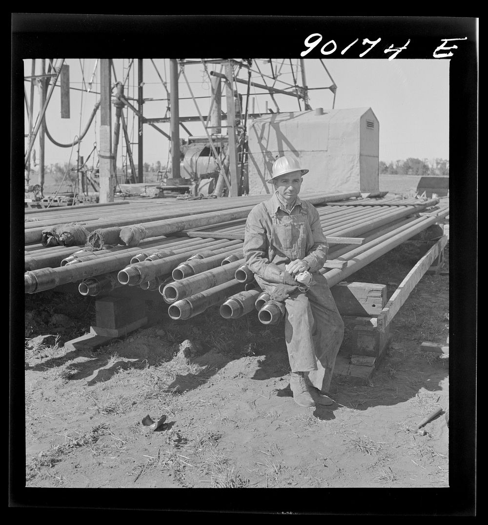 Floyd Swick, welder from Newton, Kansas worked in oil fields about ten years; cutting tool joints off a drill pipe in…